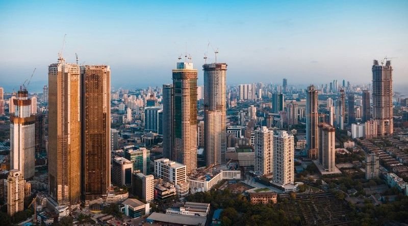 "High-rise residential and commercial buildings in Mumbai skyline, highlighting premium real estate options including 3 BHK in Borivali East."